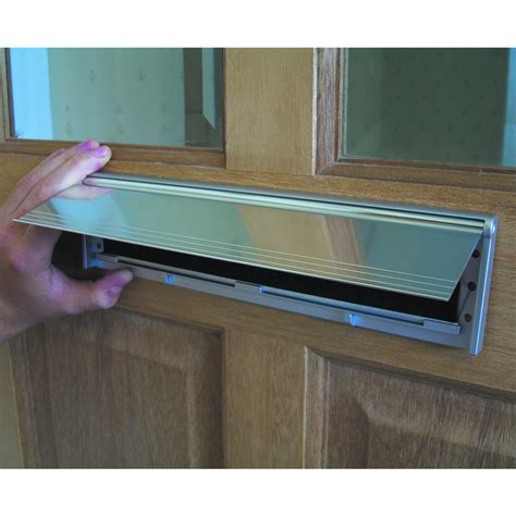 Hinged flap draught excluder  Old doors that have warped or have gaps allow heat to escape